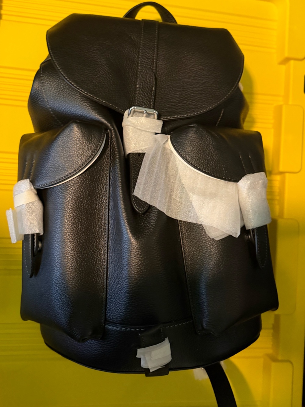 Coach Black Pebbled Backpack with Buckle Accents